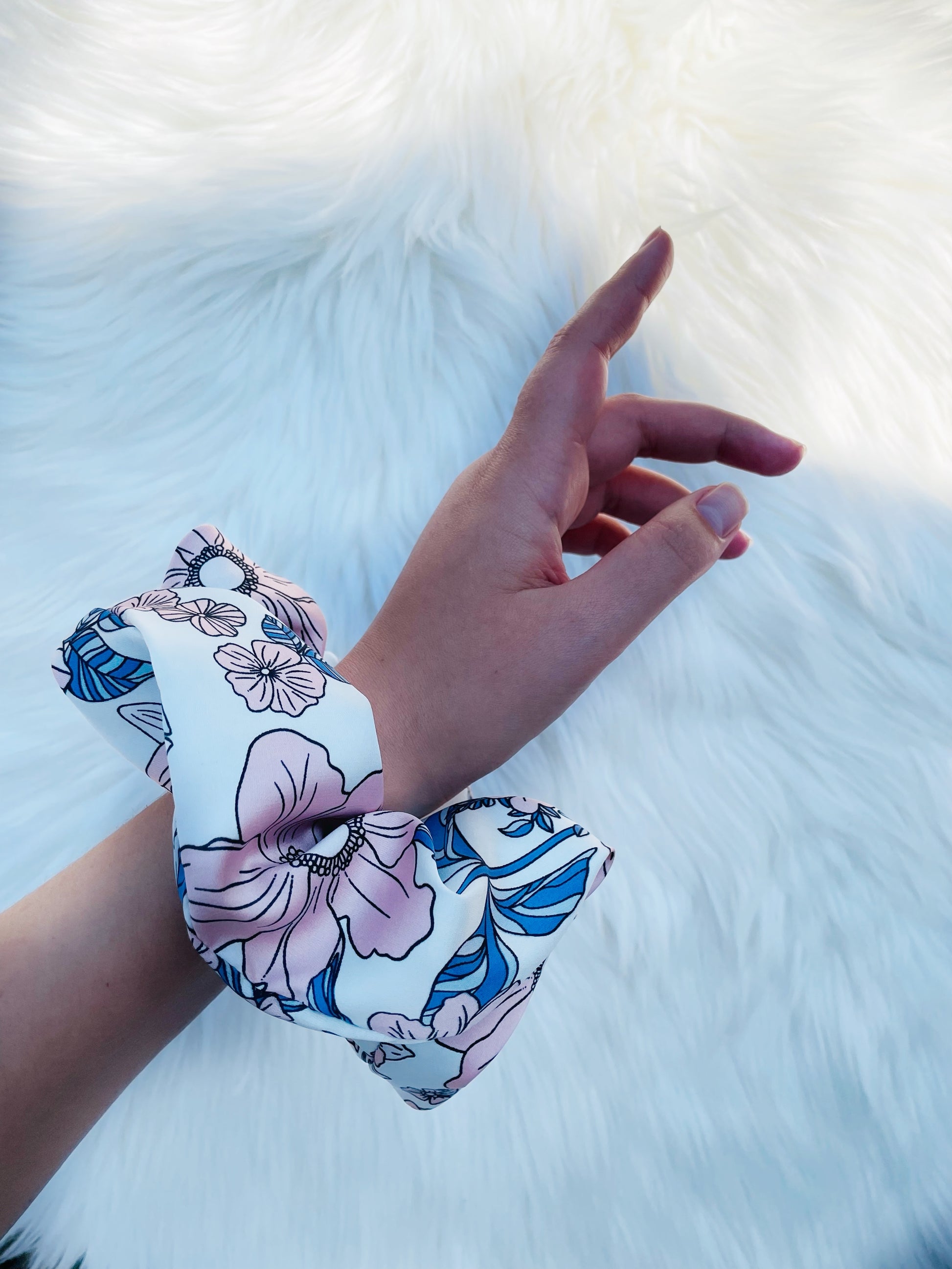 EMALINE| EMI AND CO | floral blue and pink satin scrunchie on wrist 