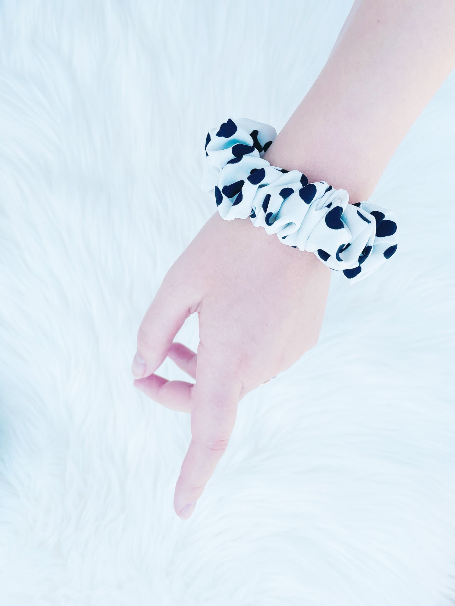 ANGELINA MINI| EMI AND CO | mini black and white polka dot scruncie on wrist 