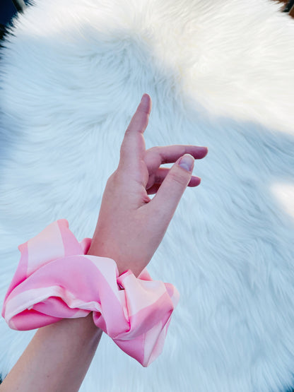 CAROLINA| EMI AND CO| pink satin scrunchie on wrist 