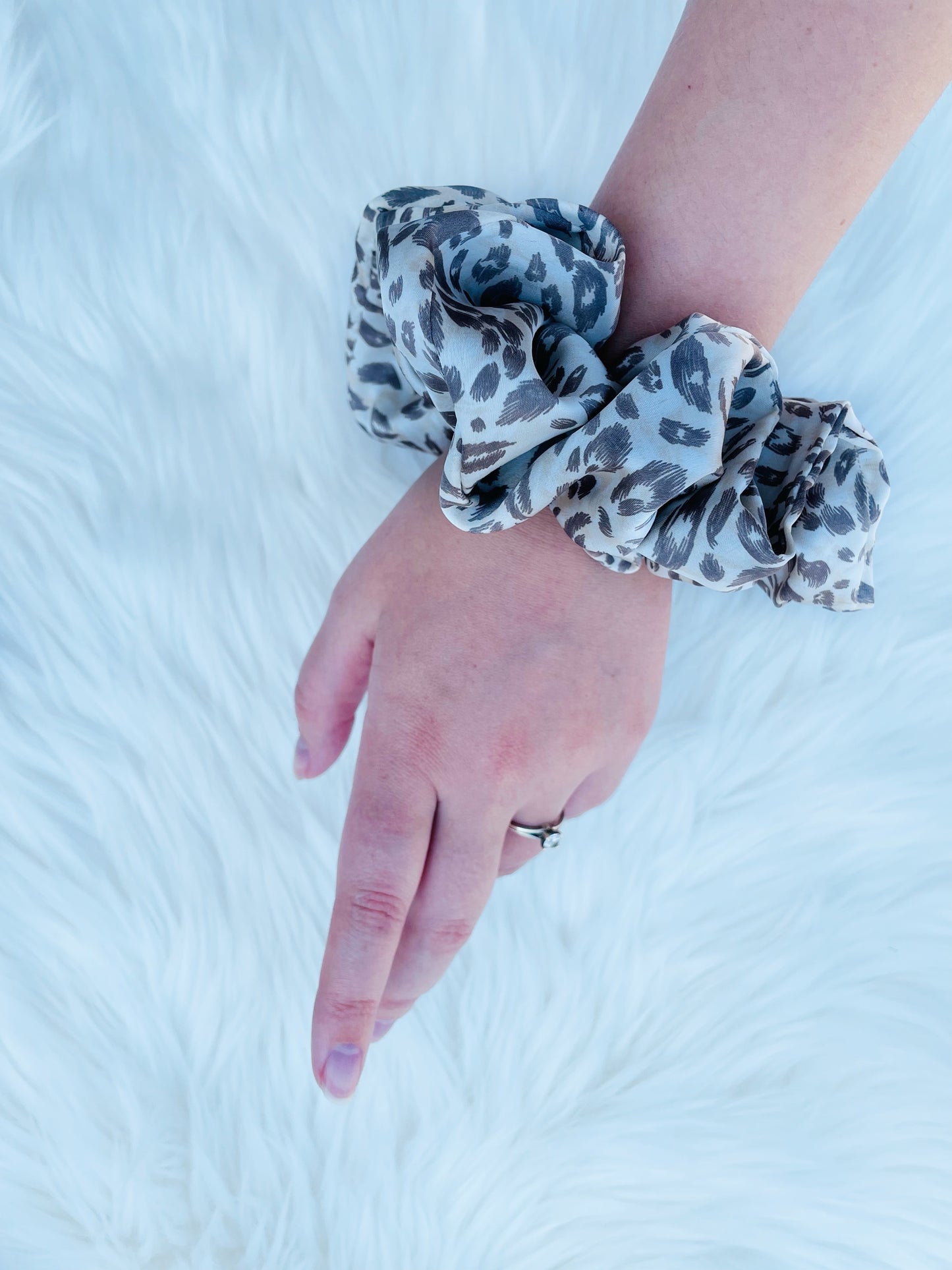 Leopard print satin scrunchie on hand | EMI AND CO | AMITY 