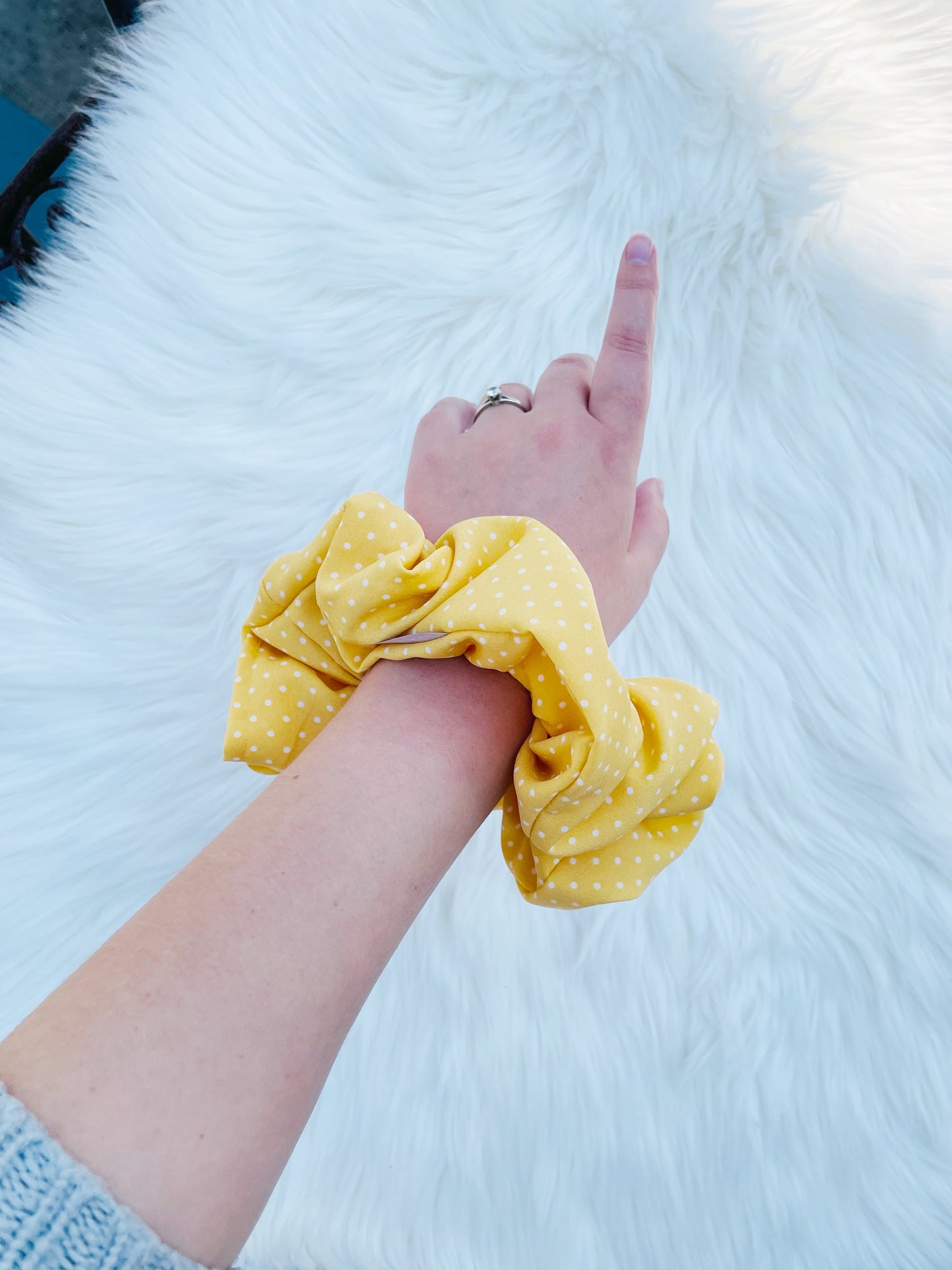 AURELIA | EMI AND CO | yellow polka dot scrunchie on wrist 