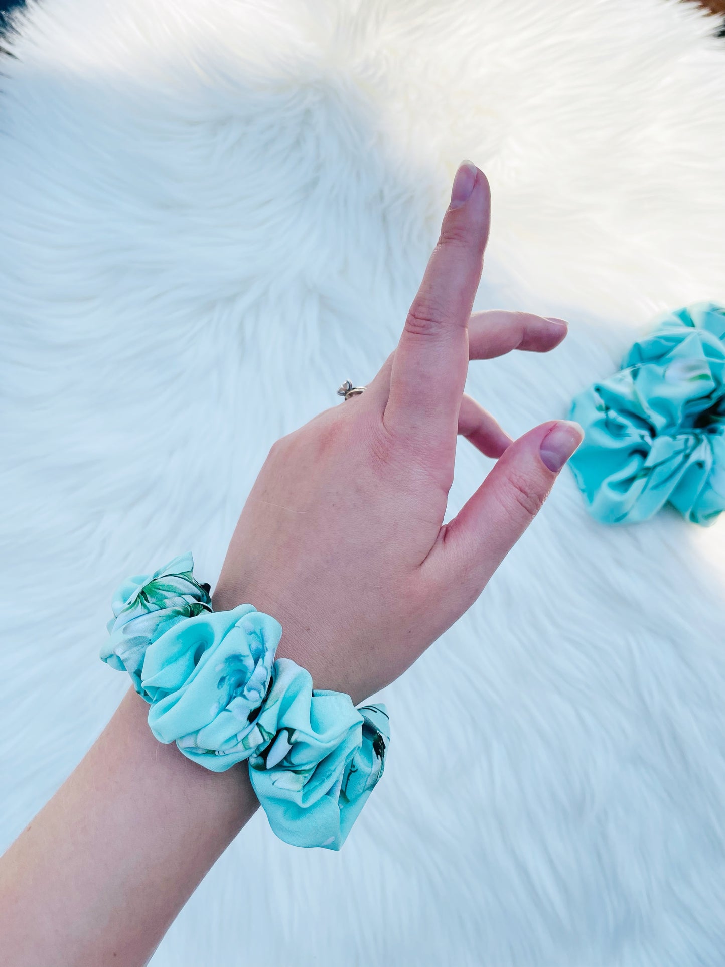 JOAN MINI| EMI AND CO | mini green floral scrunchie on wrist 