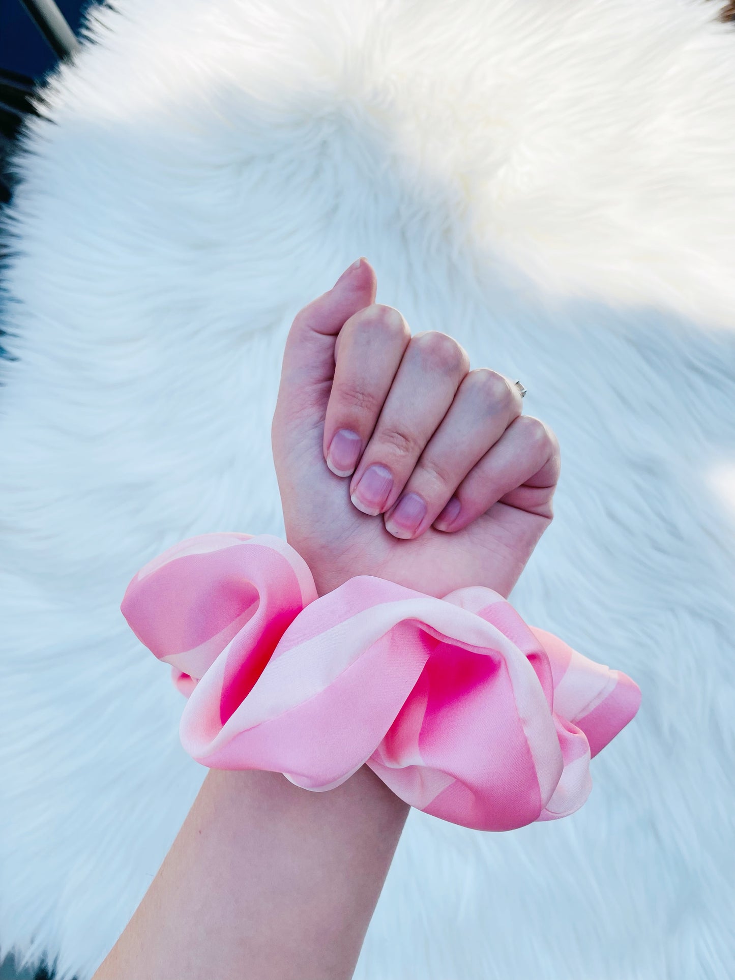 CAROLINA | EMI AND CO | pink satin scrunchies on wrist 