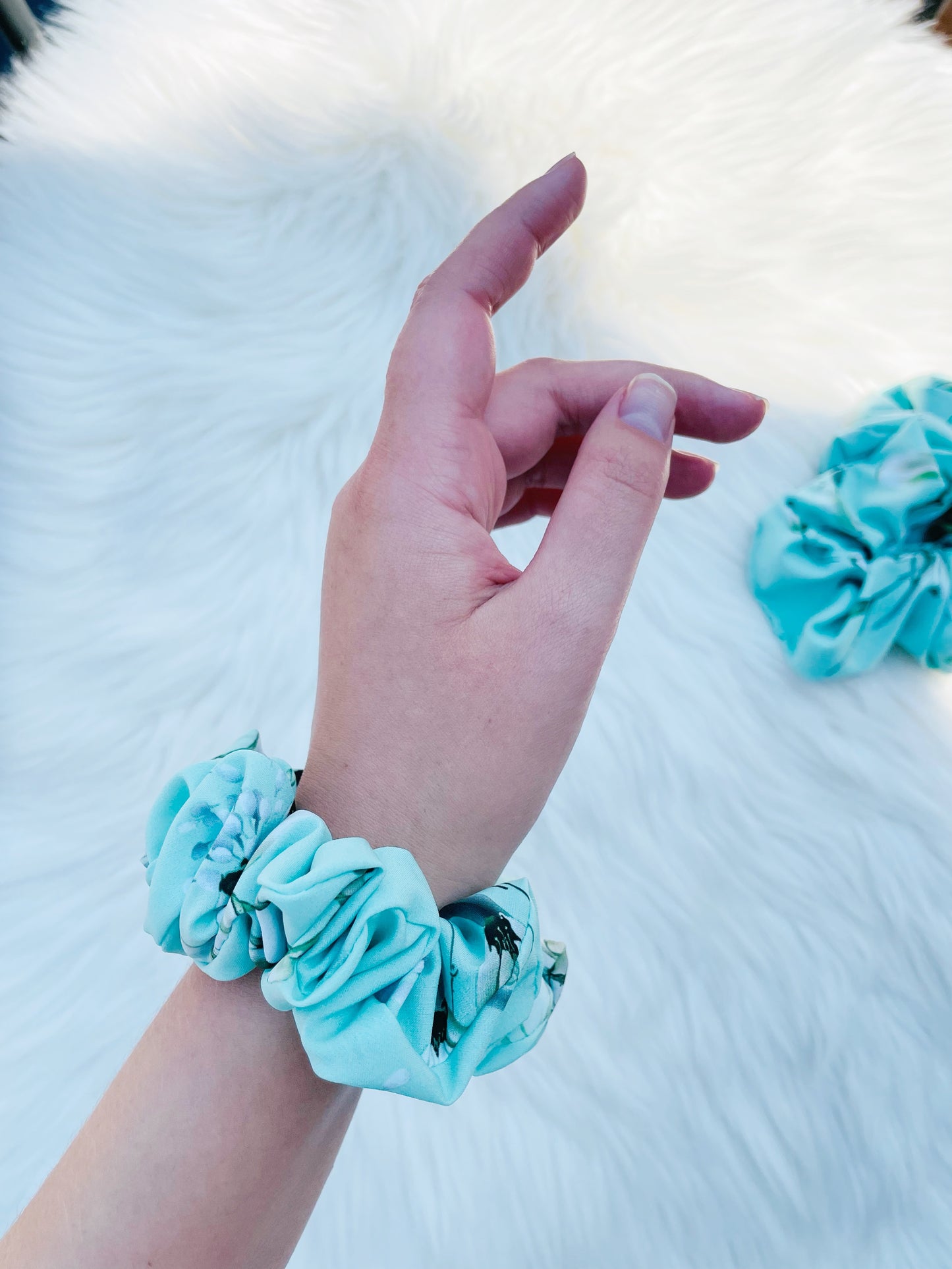 JOAN MINI| EMI AND CO | mini green floral scrunchie on wrist 