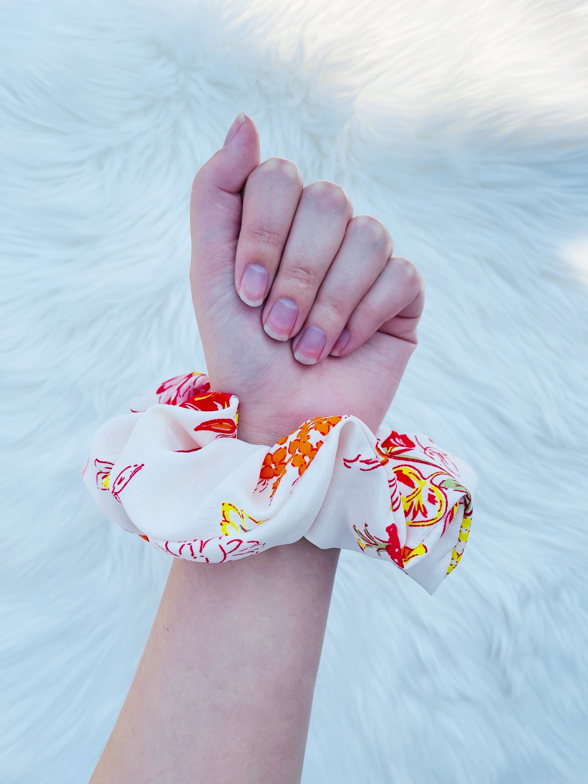 POPPY|EMI AND CO| White and orange floral scrunchie