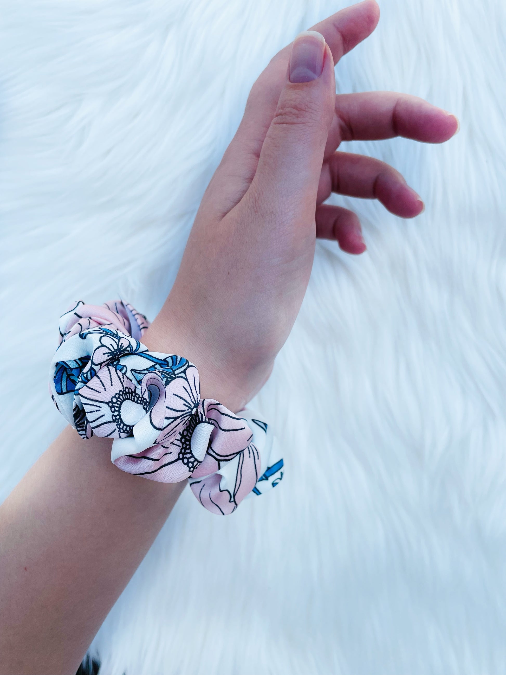 EMALINE MINI| EMI AND CO | floral mini satin blue and pink scruncie on writst 