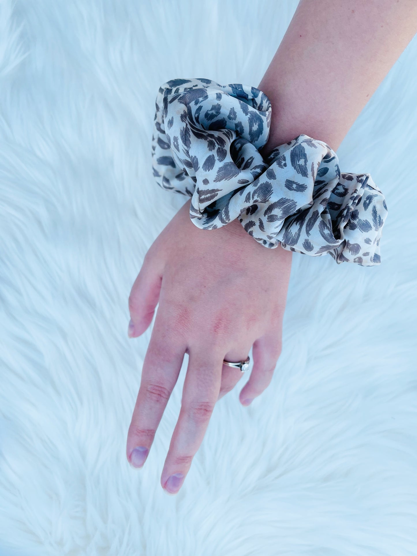 Leopard print satin scrunchie on hand | EMI AND CO | AMITY 