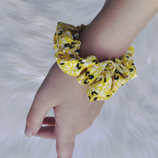 ZARI MINI| EMI AND CO |mini yellow floral scrunchie on wrist 