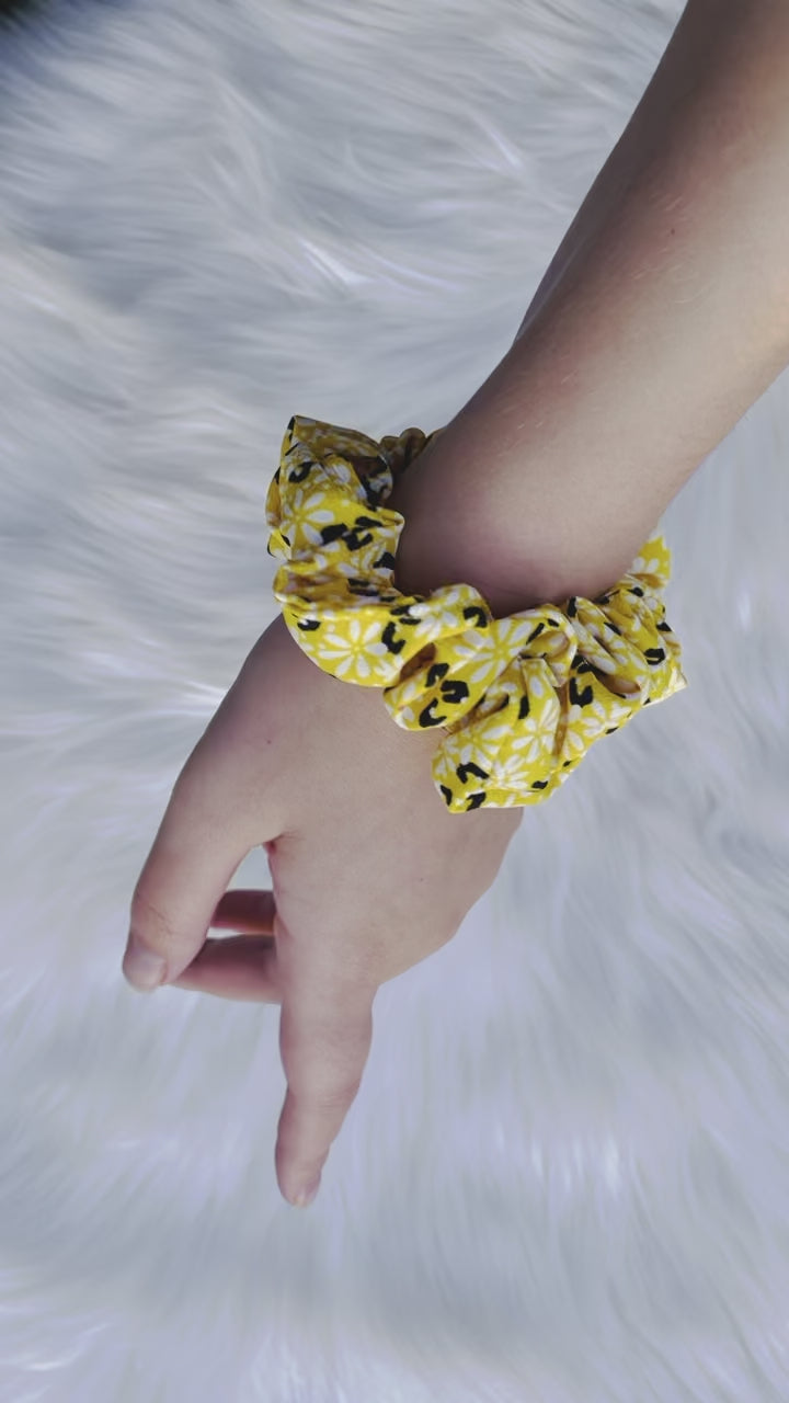 ZARI MINI| EMI AND CO |mini yellow floral scrunchie on wrist 