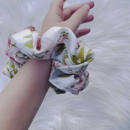 KAYOMI | EMI AND CO | satin pink and green scrunchie on wrist 