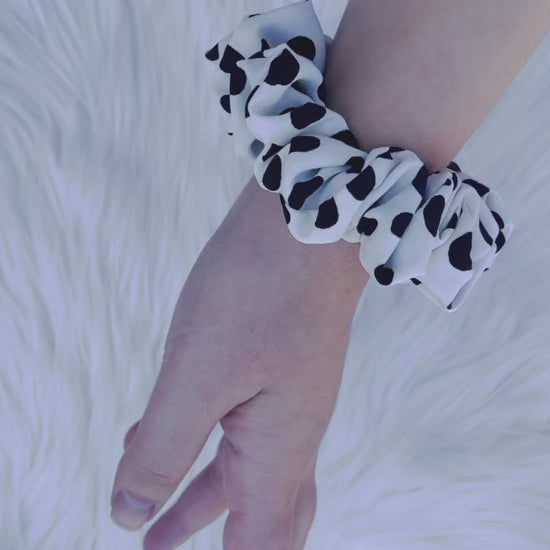 ANGELINA MINI | EMI AND CO| mini black and white polka dot scrunchie on wrist