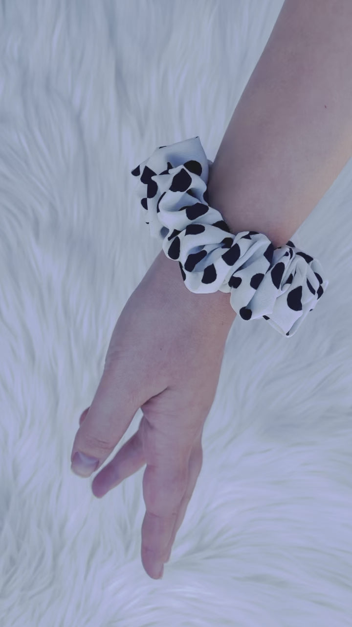 ANGELINA MINI | EMI AND CO| mini black and white polka dot scrunchie on wrist