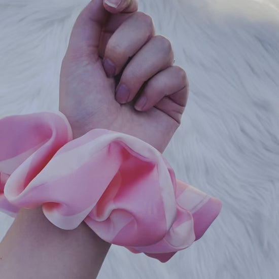 CAROLINA| EMI AND CO | pink satin scrunchie on wrist 