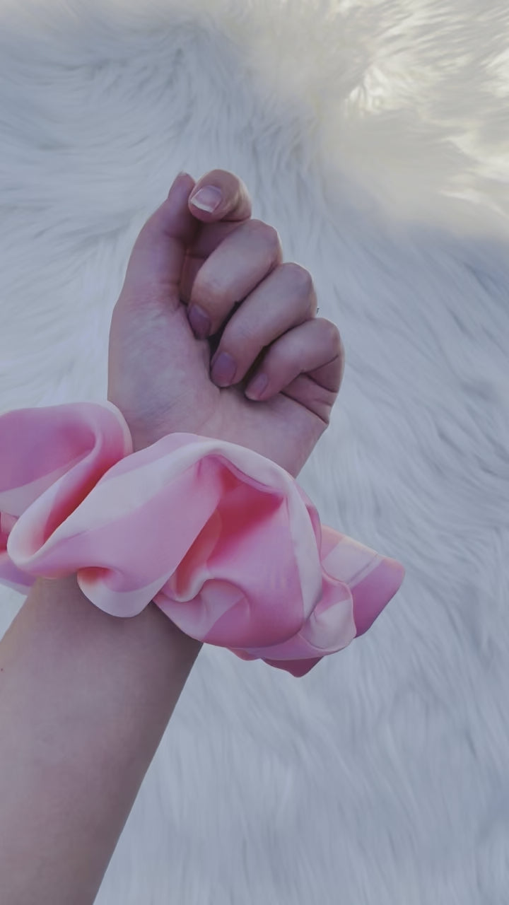 CAROLINA| EMI AND CO | pink satin scrunchie on wrist 