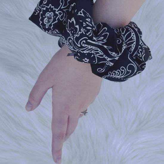 CLEMENTINE | EMI AND CO | black and white floral scrunchie on wriist