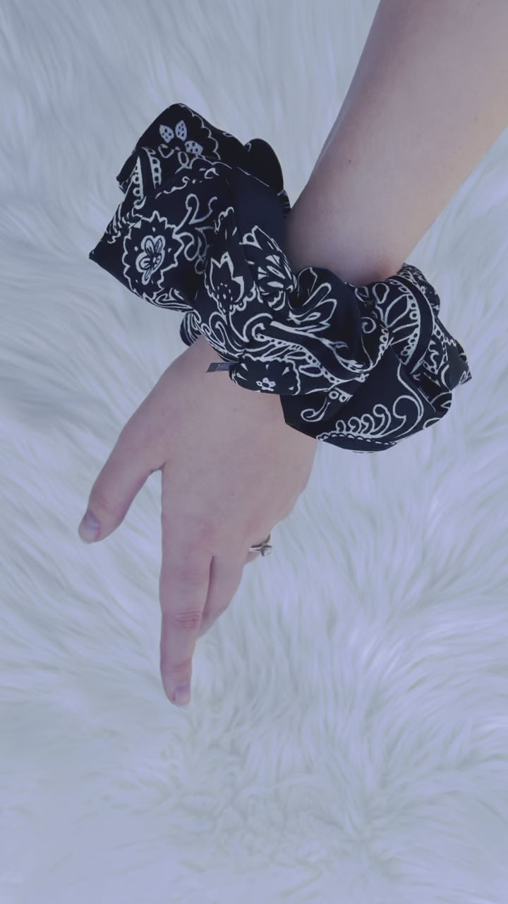 CLEMENTINE | EMI AND CO | black and white floral scrunchie on wriist