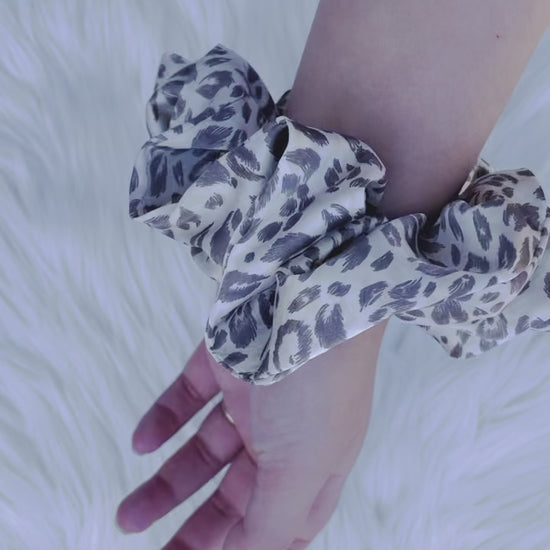 Leopard print satin scrunchie on hand | EMI AND CO | AMITY 