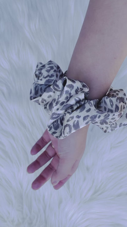 Leopard print satin scrunchie on hand | EMI AND CO | AMITY 