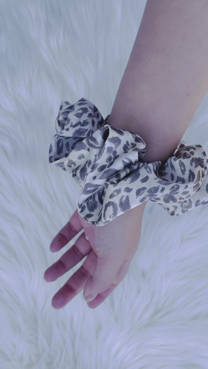 Leopard print satin scrunchie on hand | EMI AND CO | AMITY 