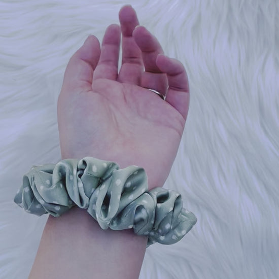 CHASITY MINI | EMI AND CO | mini green satin scrunchie on wrist 