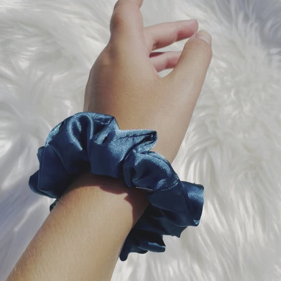 MARLENE MINI| EMI AND CO | mini blue satin scrunchie on wrist 
