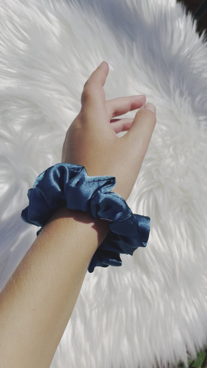 MARLENE MINI| EMI AND CO | mini blue satin scrunchie on wrist 