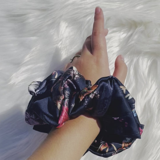 HAILEY | EMI AND CO | floral satin blue scrunchie on wrist 