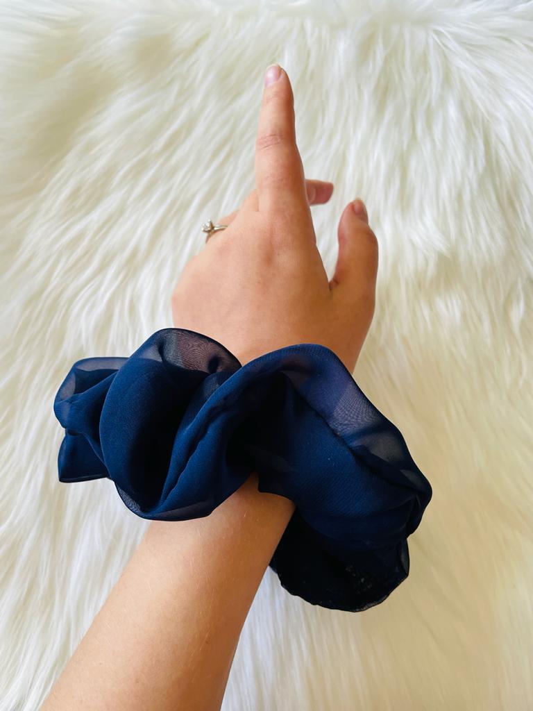 navy blue oversized chiffon scrunchie on wrist  |EMI & CO | AMARA