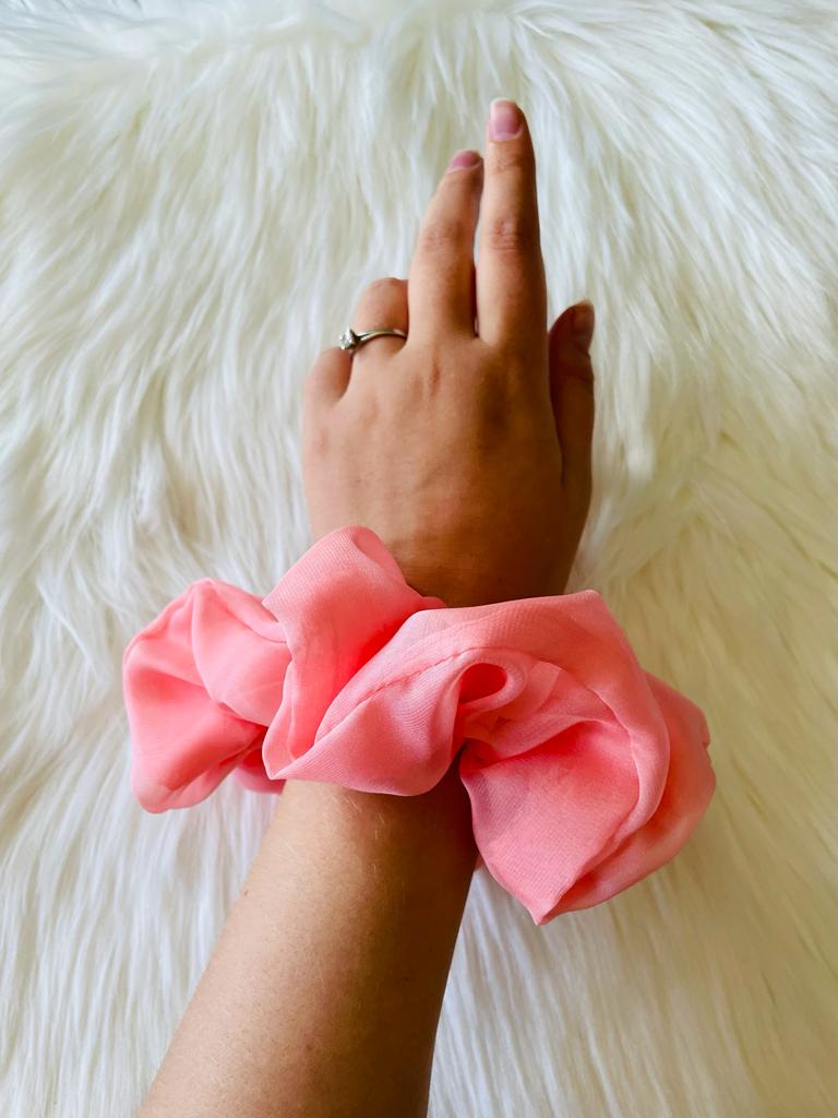 Peach pink oversized chiffon scrunchies on wrist  | EMI & CO | ELORA 