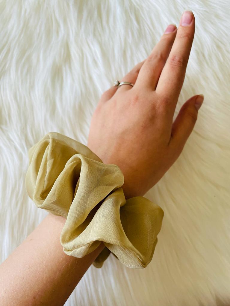 moss green oversized chiffon scrunchie on wrist  | EMI & CO | Felicity 