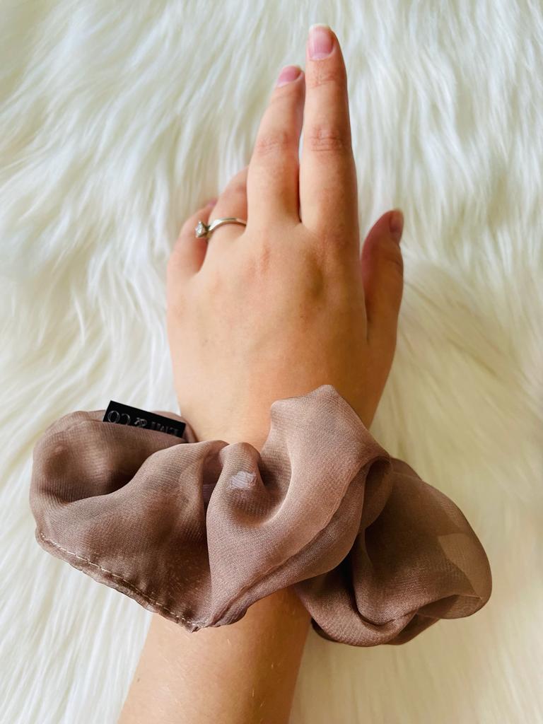 brown oversized chiffon scrunchie on wrist| EMI & CO | HAZEL