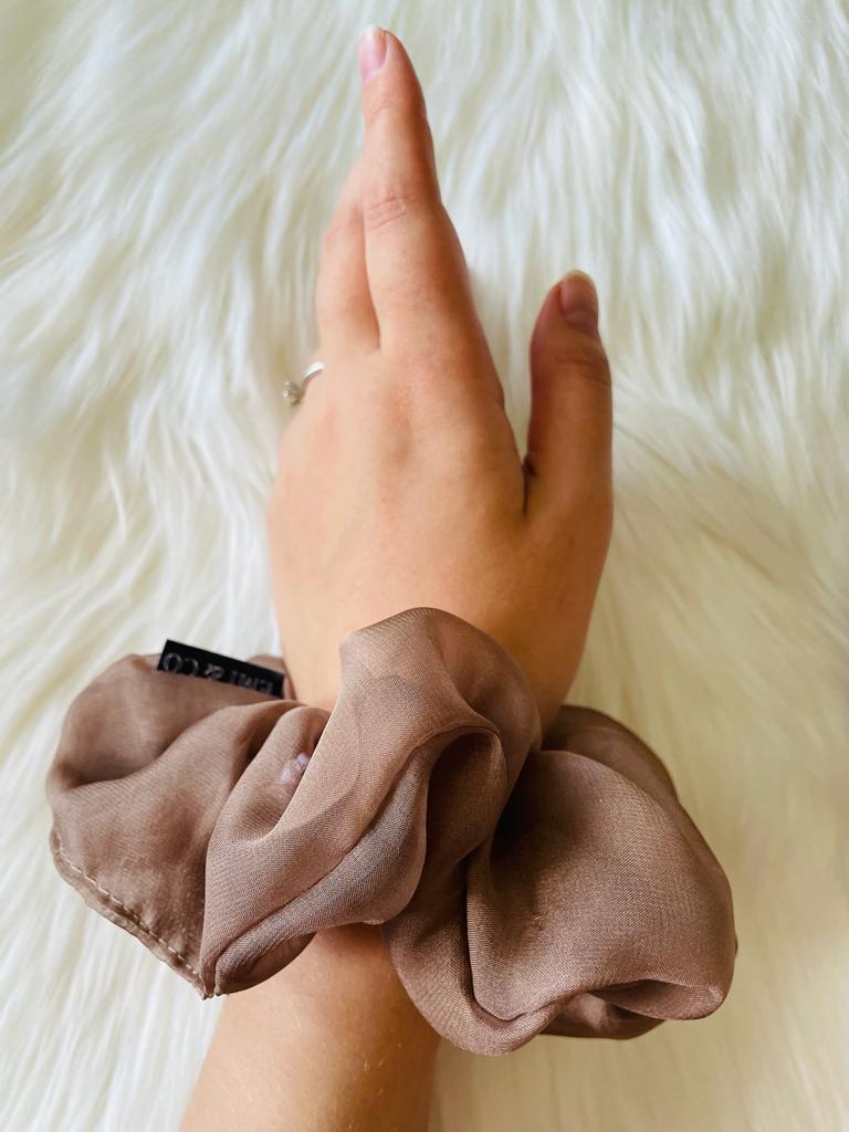 brown oversized chiffon scrunchie on wrist | EMI & CO | HAZEL