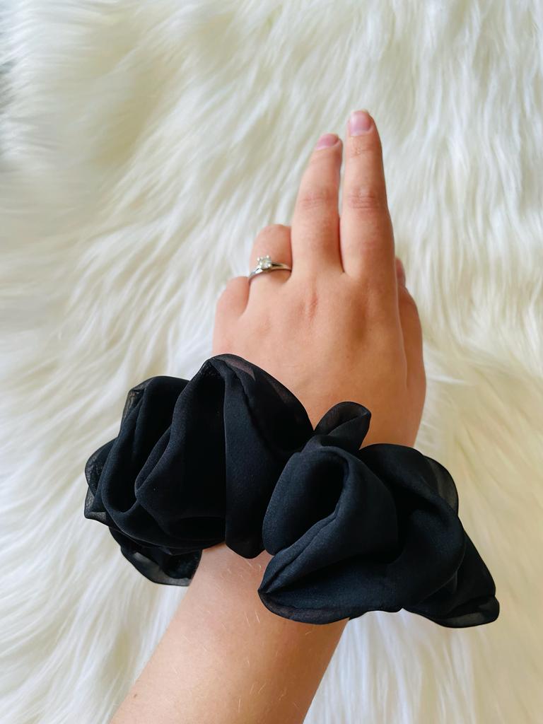 oversized black chiffon scrunchie on wrist | EMI & CO | LOLA 