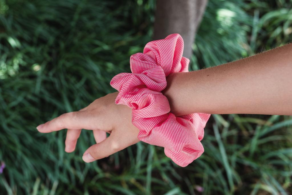 AVERY | EMI & CO | pink scrunchie on wrist