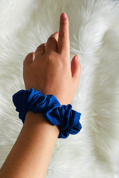 COURAGEOUS | EMI & CO | mini royal blue scrunchie on the wrist