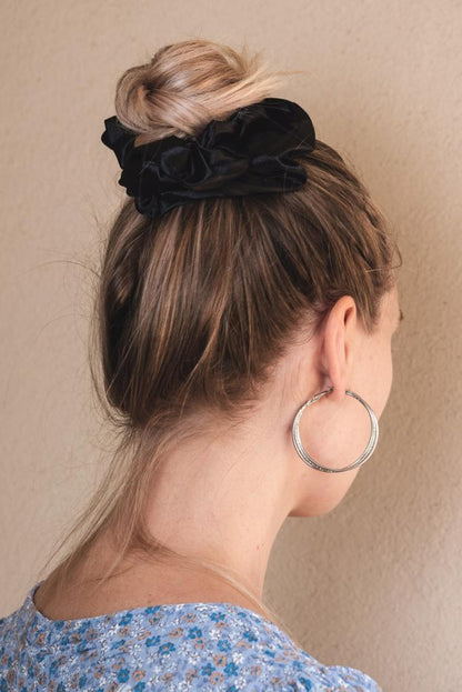 LINEO | EMI & CO | messy bun with black satin oversized scrunchie 