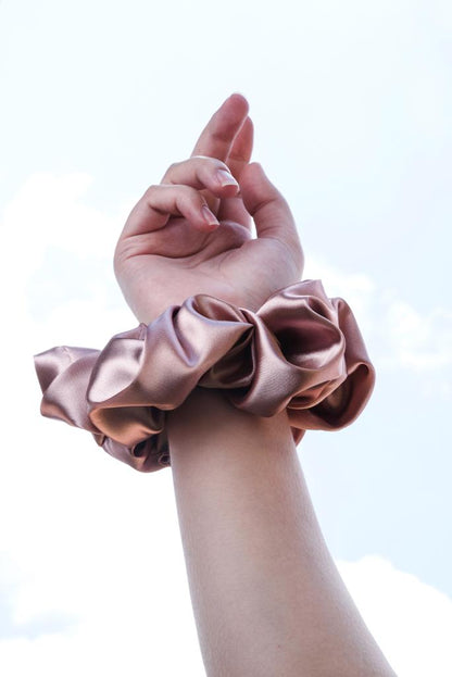 MAYA | EMI & CO | pink satin oversize scrunchie on wrist 