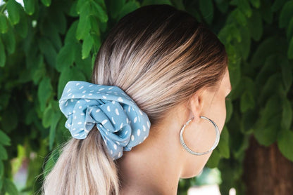 CLAIRE | EMI & CO | blue polka dot scrunchie in hair 