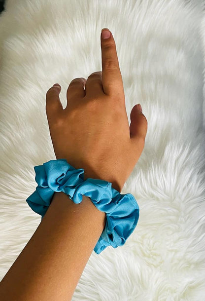 DISCIPLINED | EMI & CO | mini sky blue scrunchie on wrist