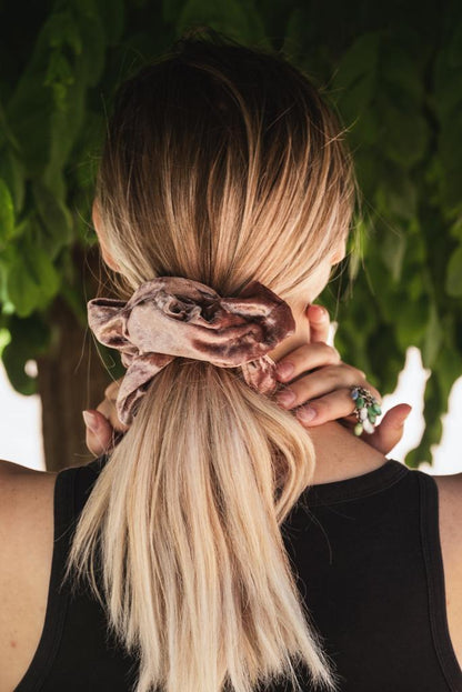 EMILY | EMI & CO | pink velvet scrunchie in woman's hair