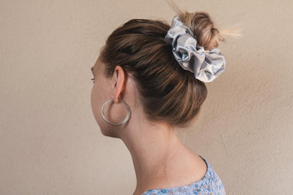 MARGARET | EMI & CO | messy bun with oversize silver satin scrunchie