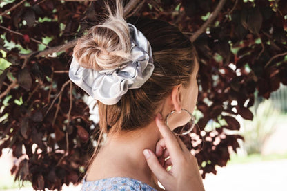 MARGARET | EMI & CO | messy bun with oversize silver satin scrunchie