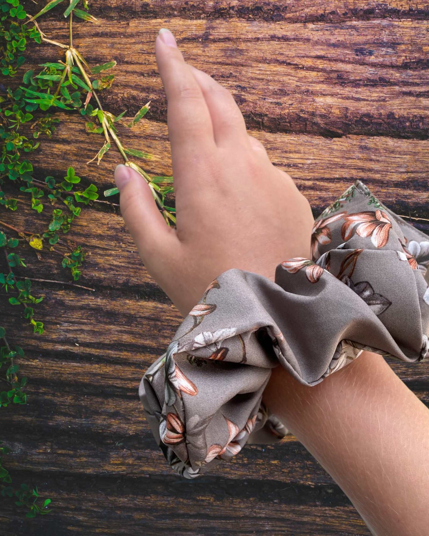 ZOE | EMI & CO | oversize brown floral scrunchie on wrist 