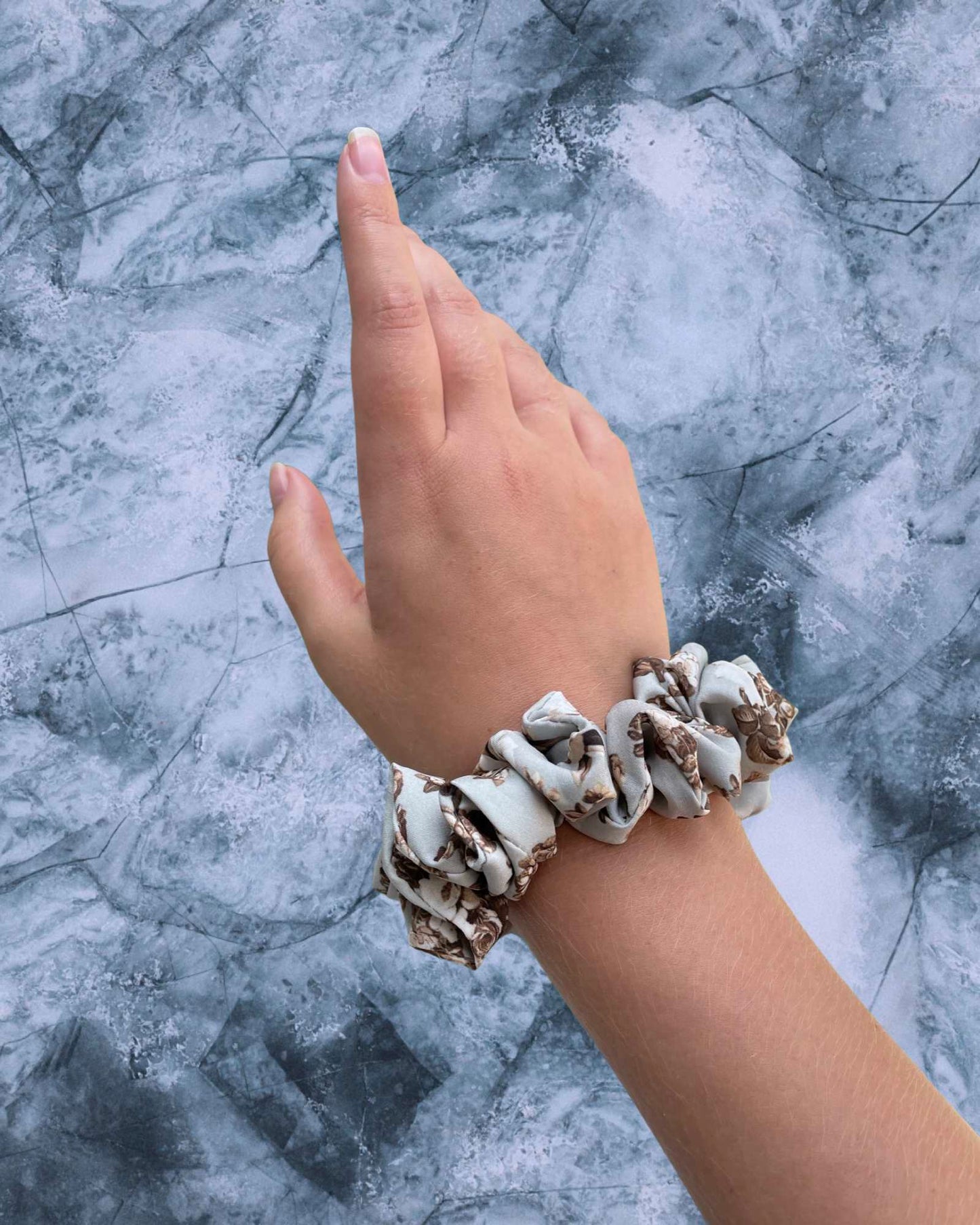 NADIA MINI | EMI & CO | mini floral grey scrunchie on wrist 