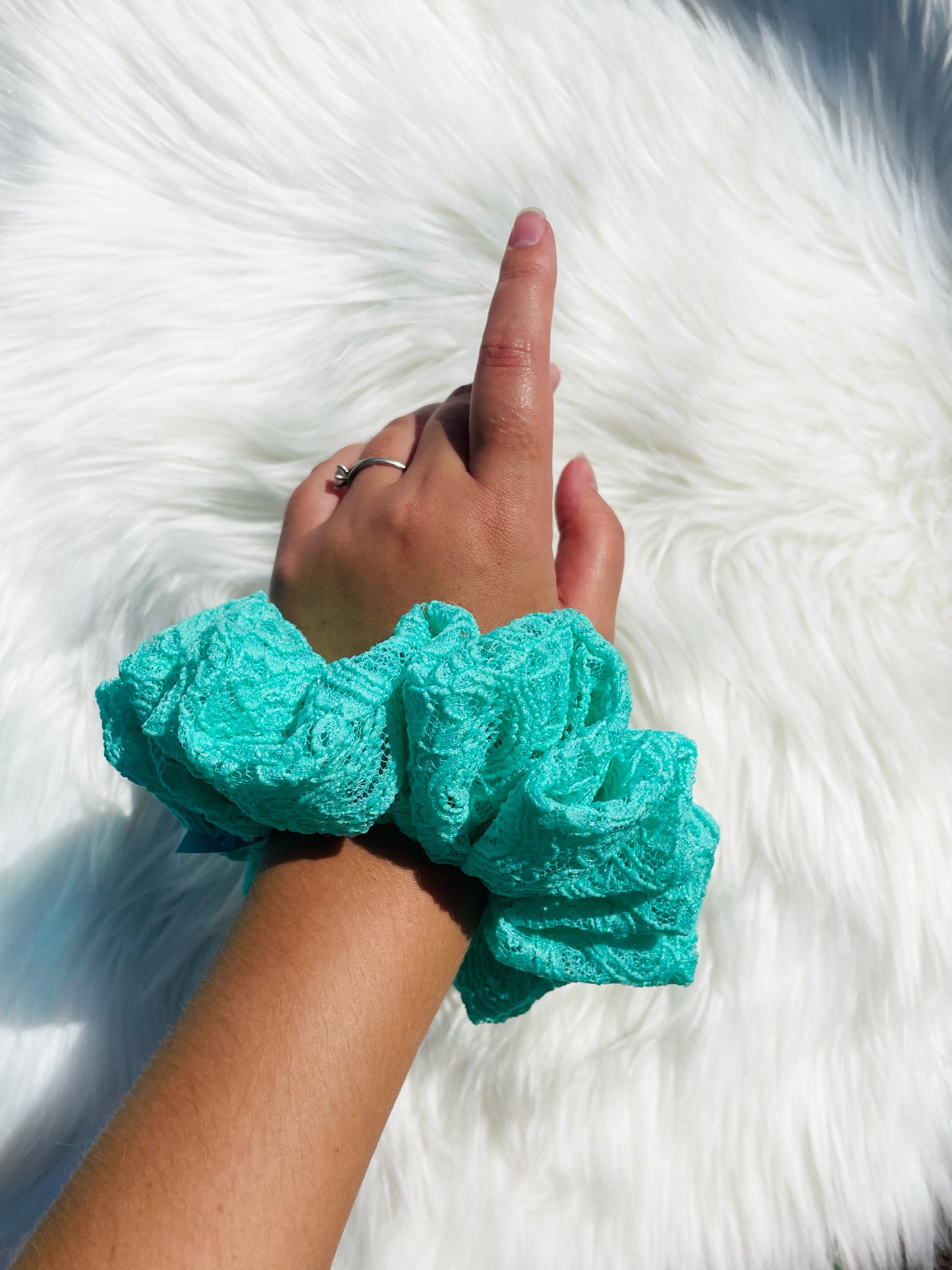 IVY| EMI AND CO | green lace scrunchie on wrist 