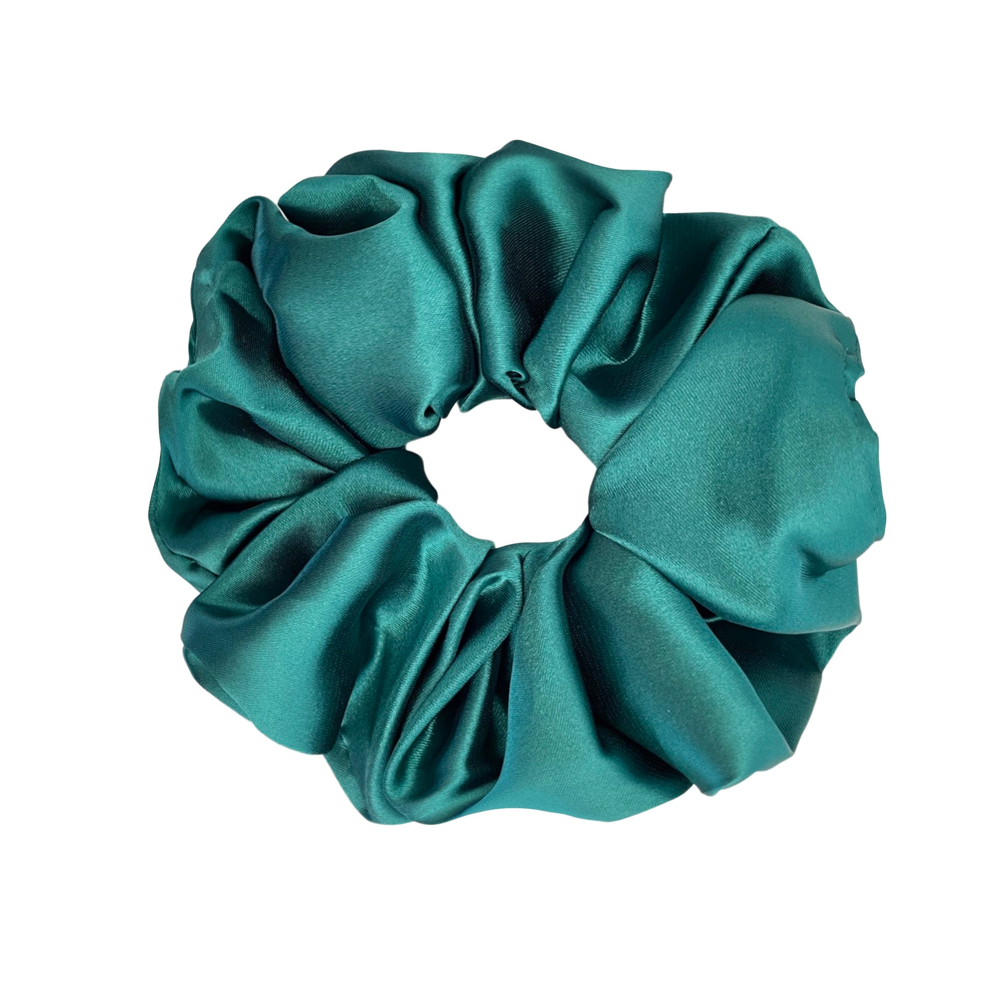 DOVA | EMI & CO | A green satin scrunchie