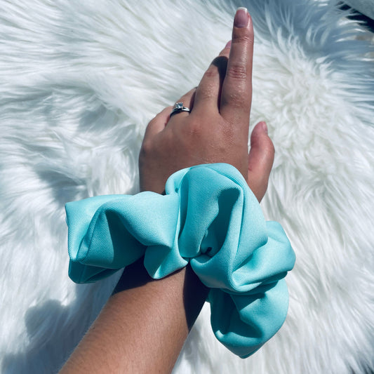 BIRDIE| EMI AND CO | blue neutral scrunchie on wrist 