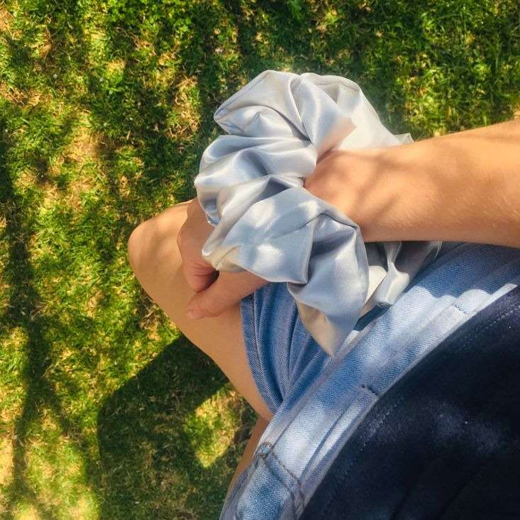 MARGARET | EMI & CO | oversize silver satin scrunchie on the wrist